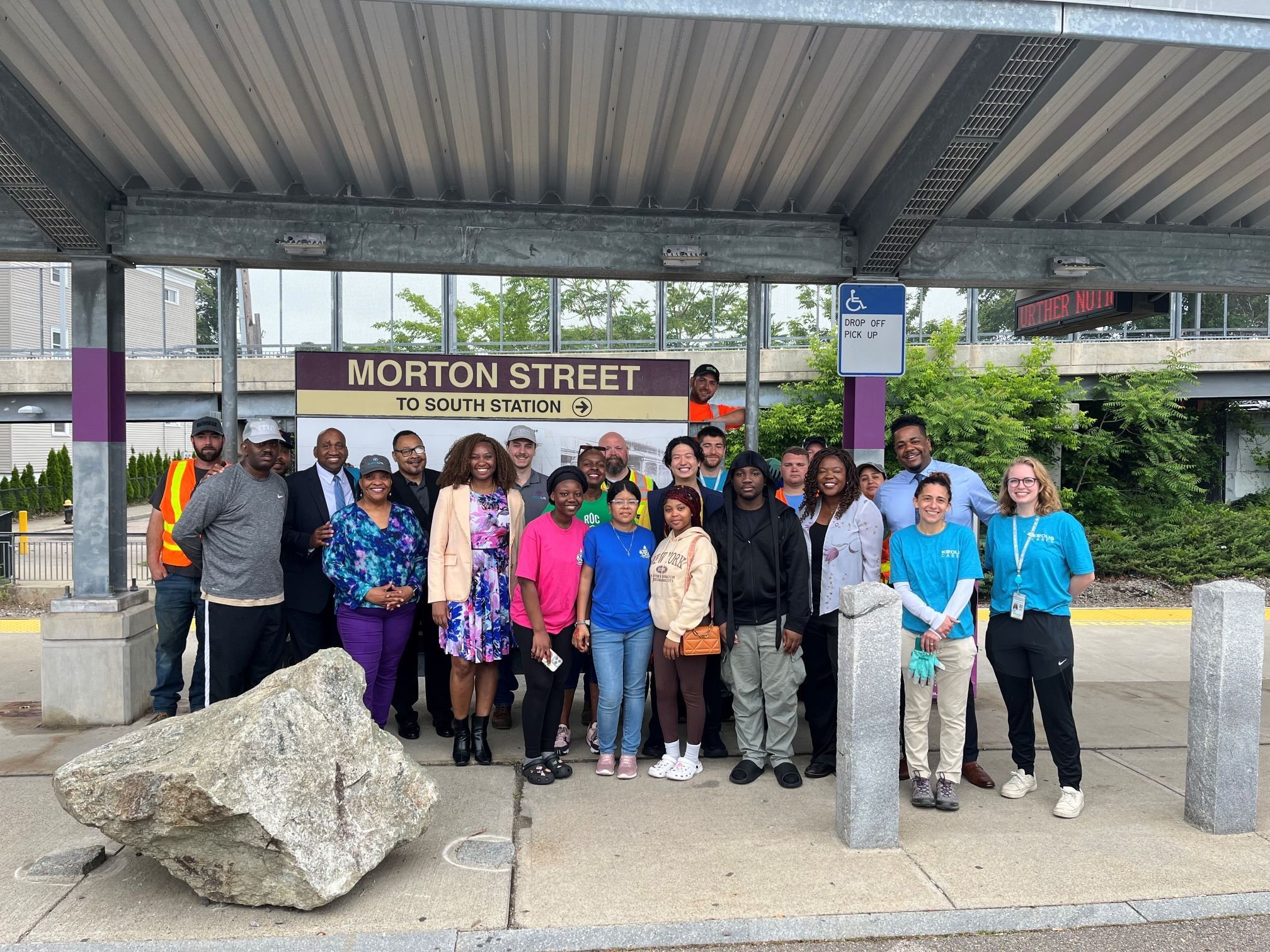 A group of Keolis staff and community volunteers at Morton Street Station